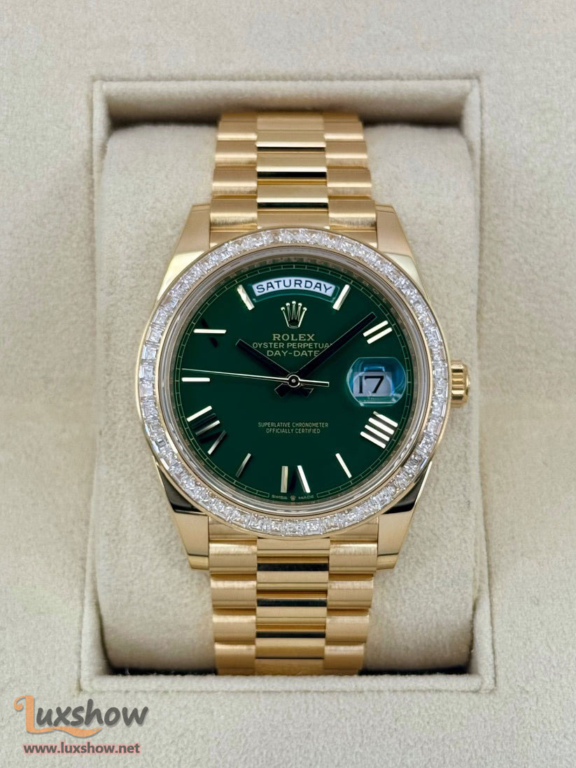 Rolex Day-Date 40mm 228398TBR 18 kt Yellow Gold Presidential Bracelet Factory Baguette Diamond-Set Bezel Green Roman Numeral Dial