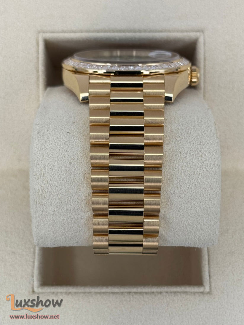 Rolex Day-Date 40mm 228398TBR 18 kt Yellow Gold Presidential Bracelet Factory Baguette Diamond-Set Bezel Green Roman Numeral Dial
