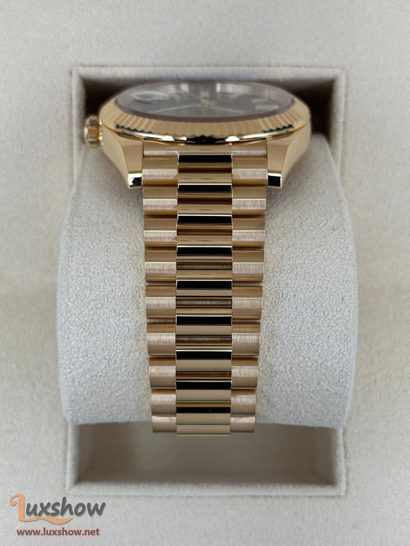 Rolex Day-Date 40mm 228238 Presidential 18kt Yellow Gold Bright Black Diamond Baguette Dial