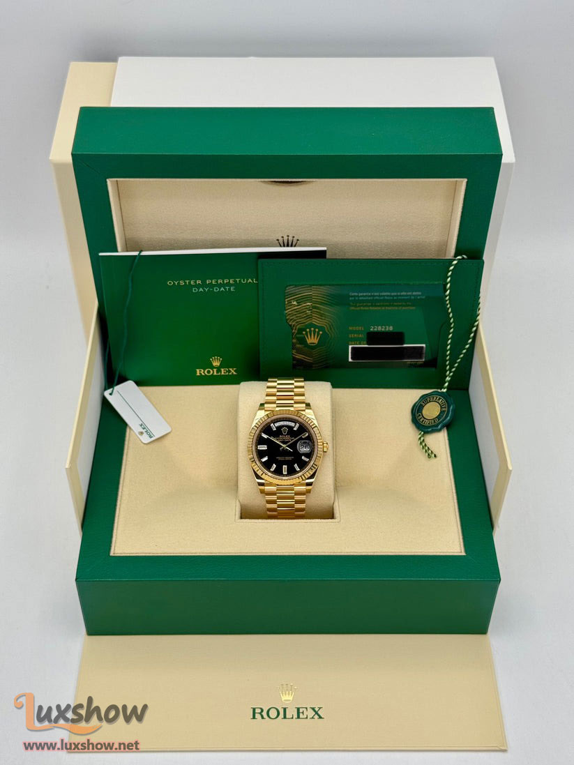 Rolex Day-Date 40mm 228238 Presidential 18kt Yellow Gold Bright Black Diamond Baguette Dial