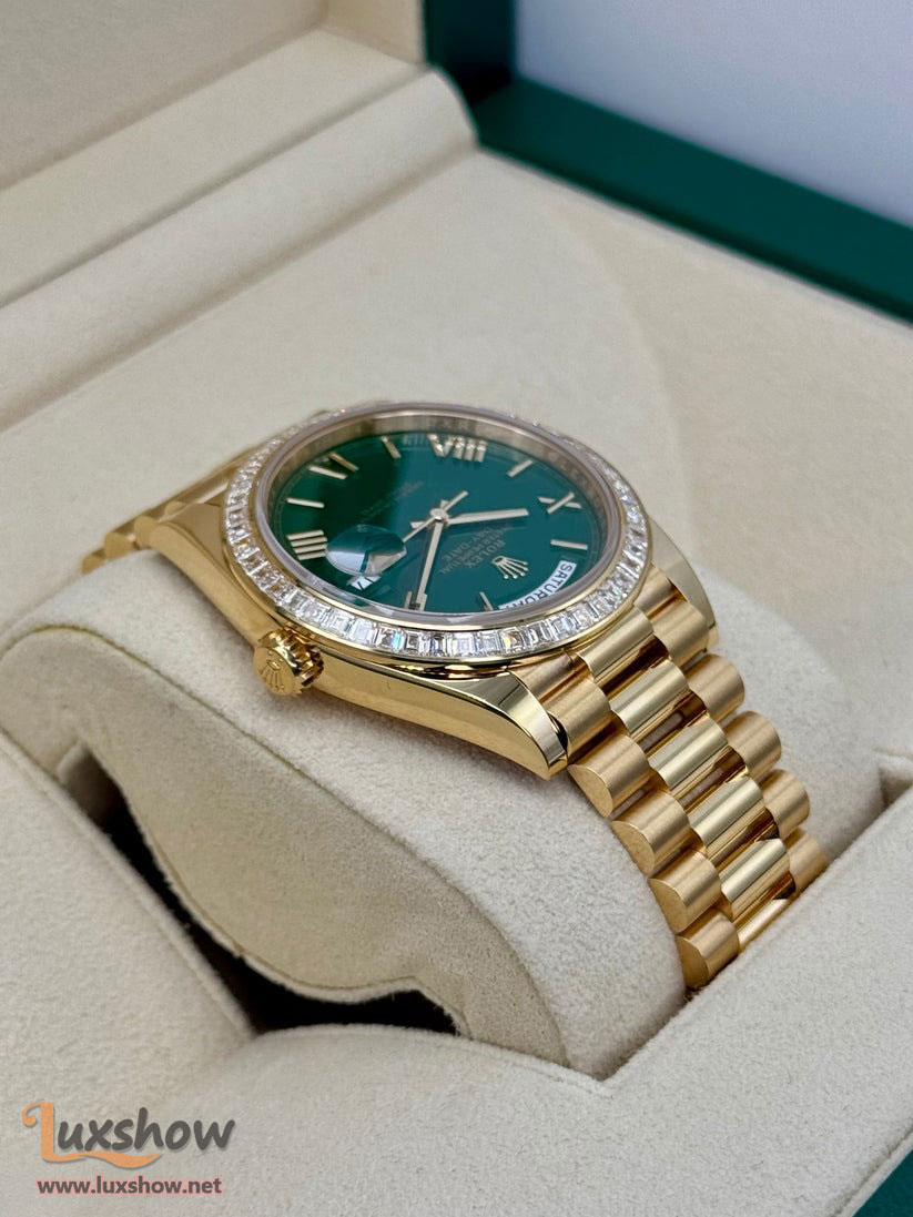 Rolex Day-Date 40mm 228398TBR 18 kt Yellow Gold Presidential Bracelet Factory Baguette Diamond-Set Bezel Green Roman Numeral Dial