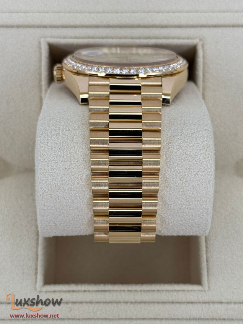 Rolex Day-Date 40mm 228348RBR Presidential Bracelet 18k Yellow Gold with Diamond Set Bezel and Diamond-Paved Dial with 10 baguette-cut diamond hour markers