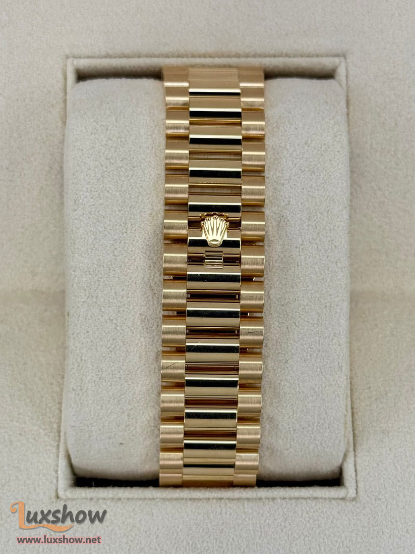 Rolex Day-Date 40mm 228398TBR 18 kt Yellow Gold Presidential Bracelet Factory Baguette Diamond-Set Bezel Green Roman Numeral Dial