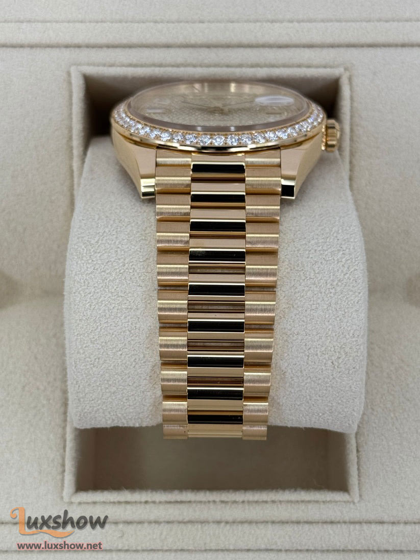 Rolex Day-Date 40mm 228348RBR Presidential Bracelet 18k Yellow Gold with Diamond Set Bezel and Diamond-Paved Dial with 10 baguette-cut diamond hour markers