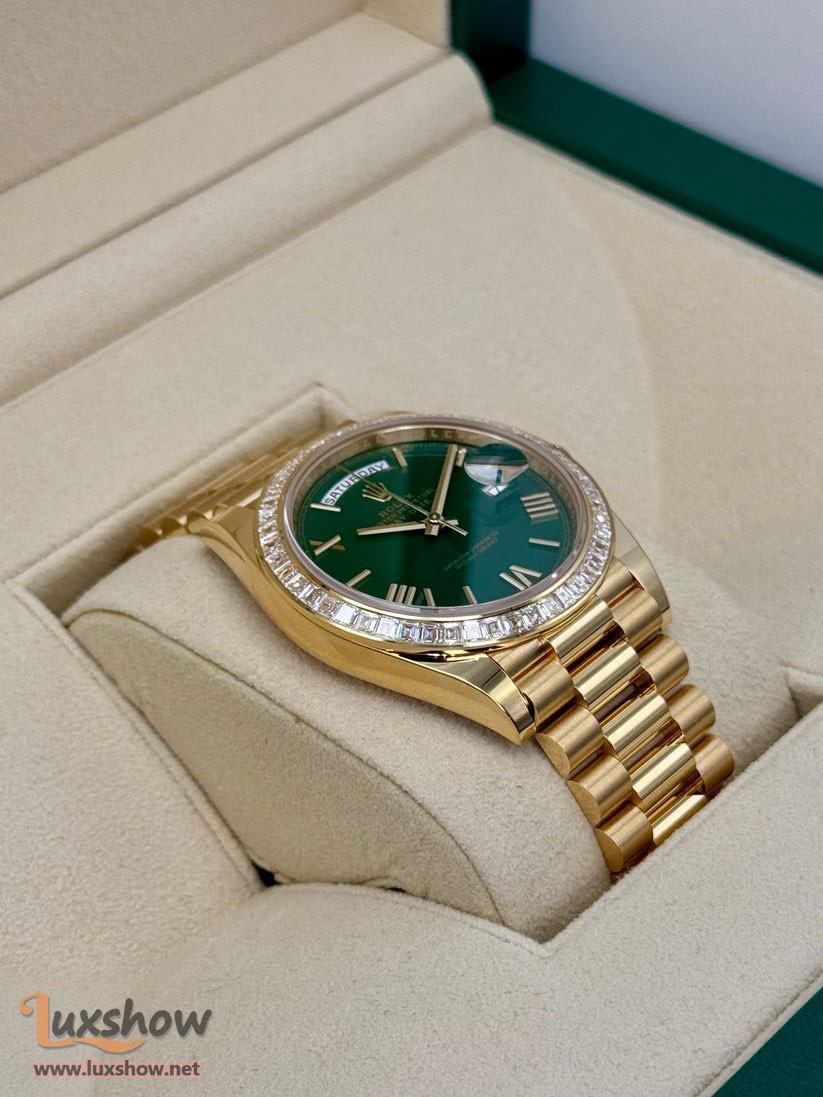 Rolex Day-Date 40mm 228398TBR 18 kt Yellow Gold Presidential Bracelet Factory Baguette Diamond-Set Bezel Green Roman Numeral Dial