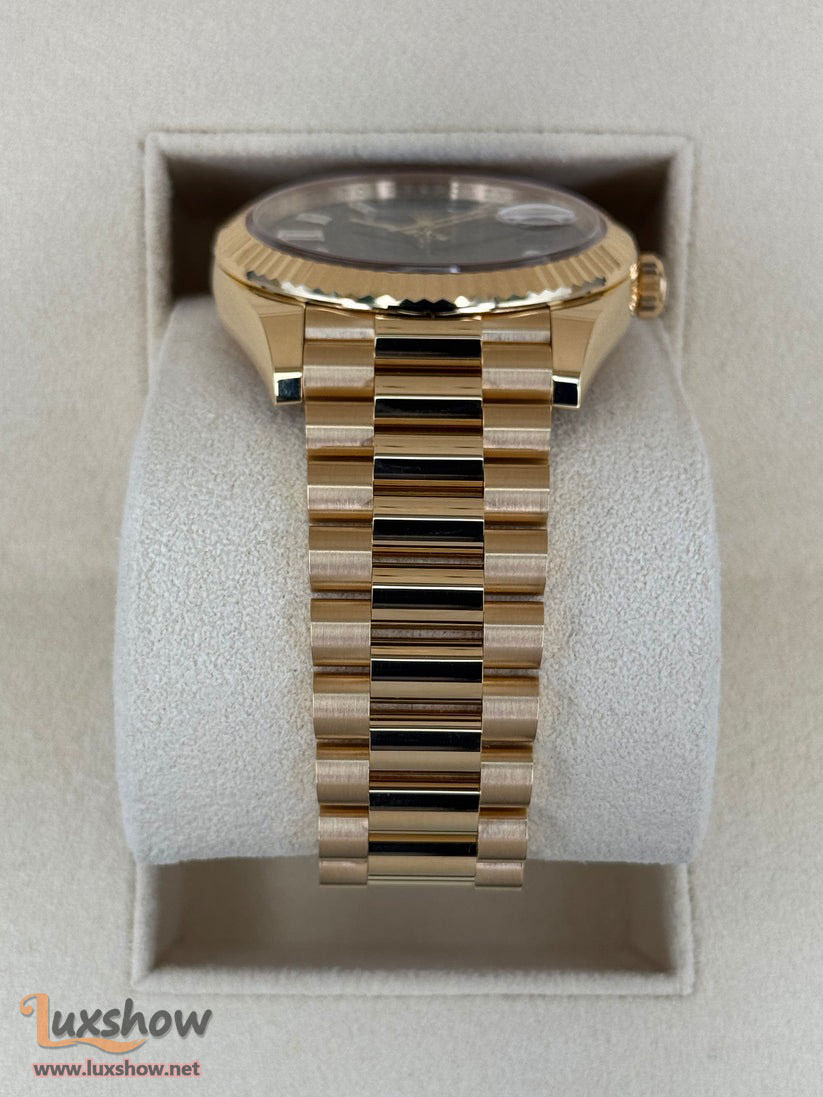 Rolex Day-Date 40mm 228238 Presidential 18kt Yellow Gold Bright Black Diamond Baguette Dial