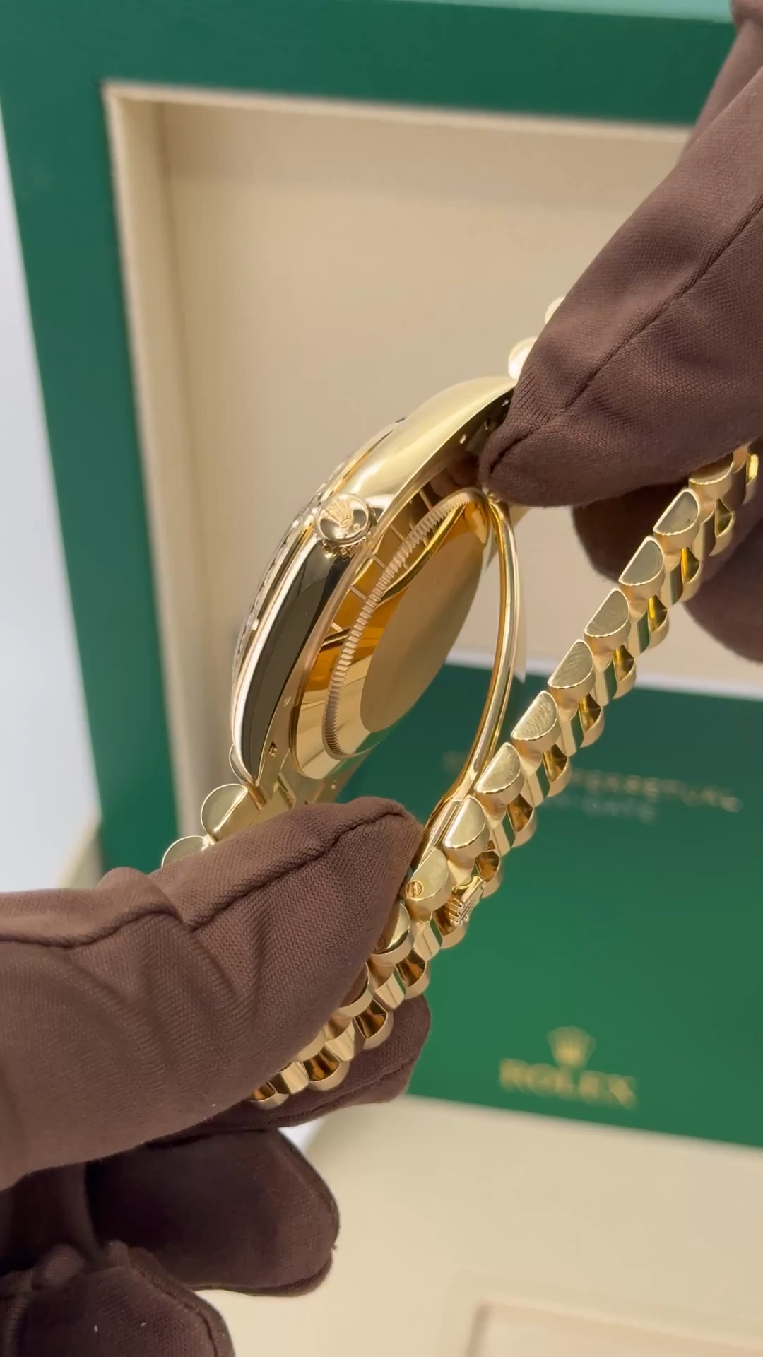 Rolex Day-Date 40mm 228348RBR Presidential Bracelet 18k Yellow Gold with Diamond Set Bezel and Diamond-Paved Dial with 10 baguette-cut diamond hour markers