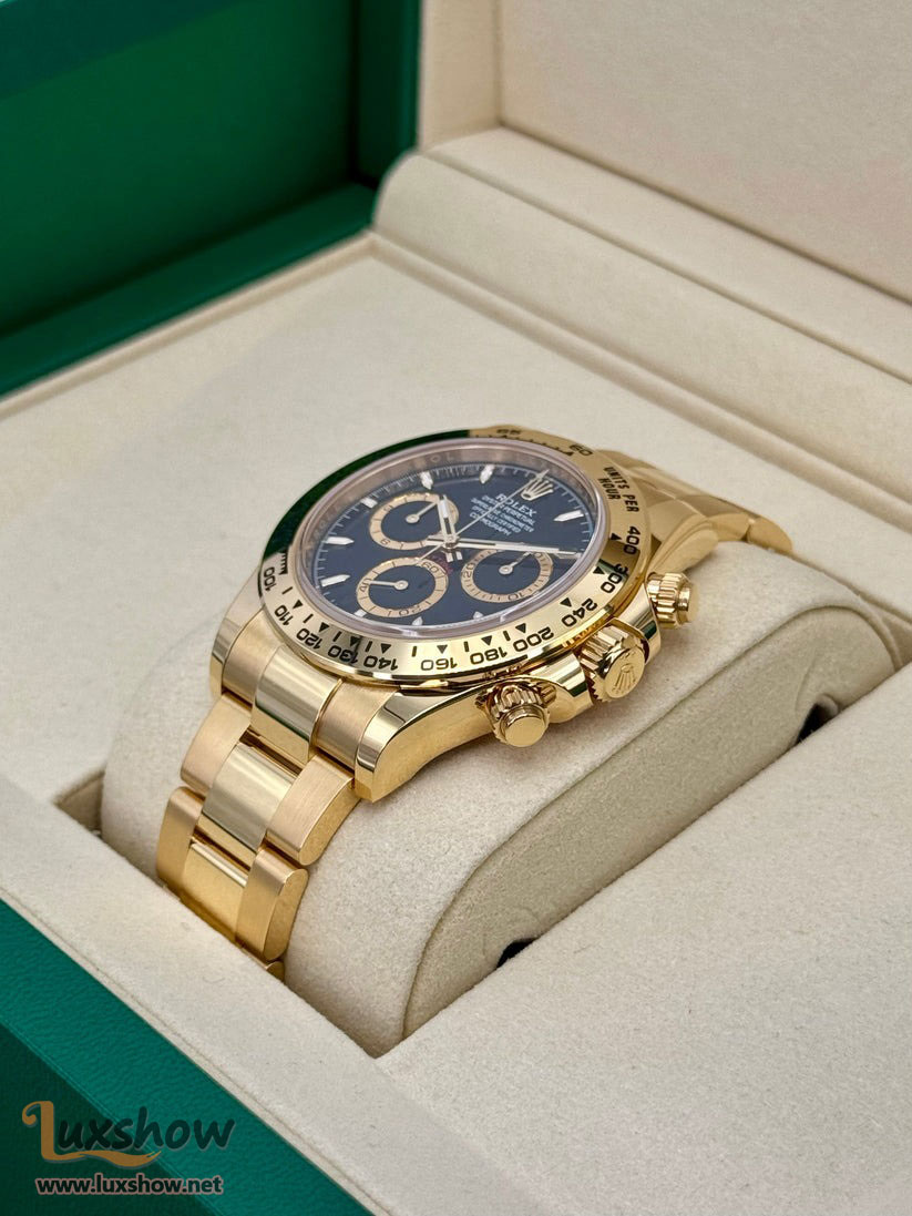 Rolex Cosmograph Daytona 40mm 126508 18kt Yellow Gold Oyster Bracelet a 18kt Yellow Gold Bezel with an Intense Black and Champagne Colour Dial