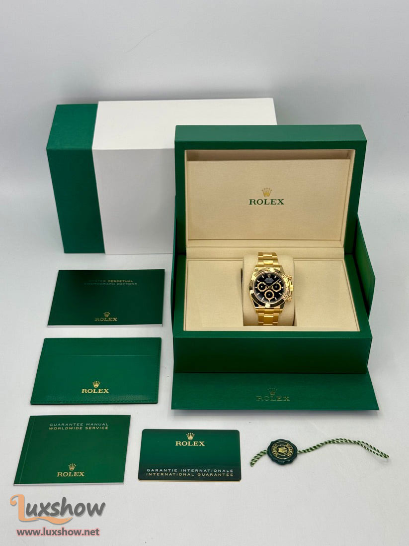 Rolex Cosmograph Daytona 40mm 126508 18kt Yellow Gold Oyster Bracelet a 18kt Yellow Gold Bezel with an Intense Black and Champagne Colour Dial