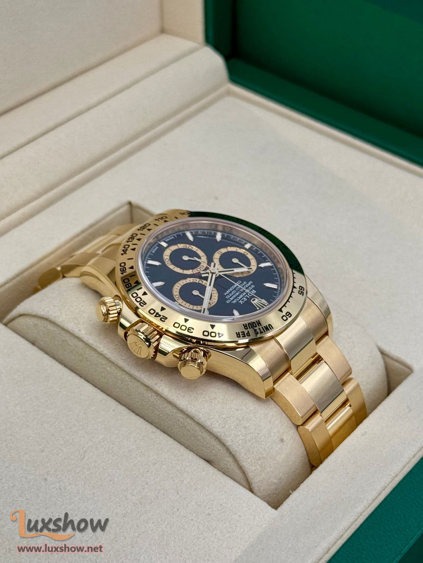 Rolex Cosmograph Daytona 40mm 126508 18kt Yellow Gold Oyster Bracelet a 18kt Yellow Gold Bezel with an Intense Black and Champagne Colour Dial