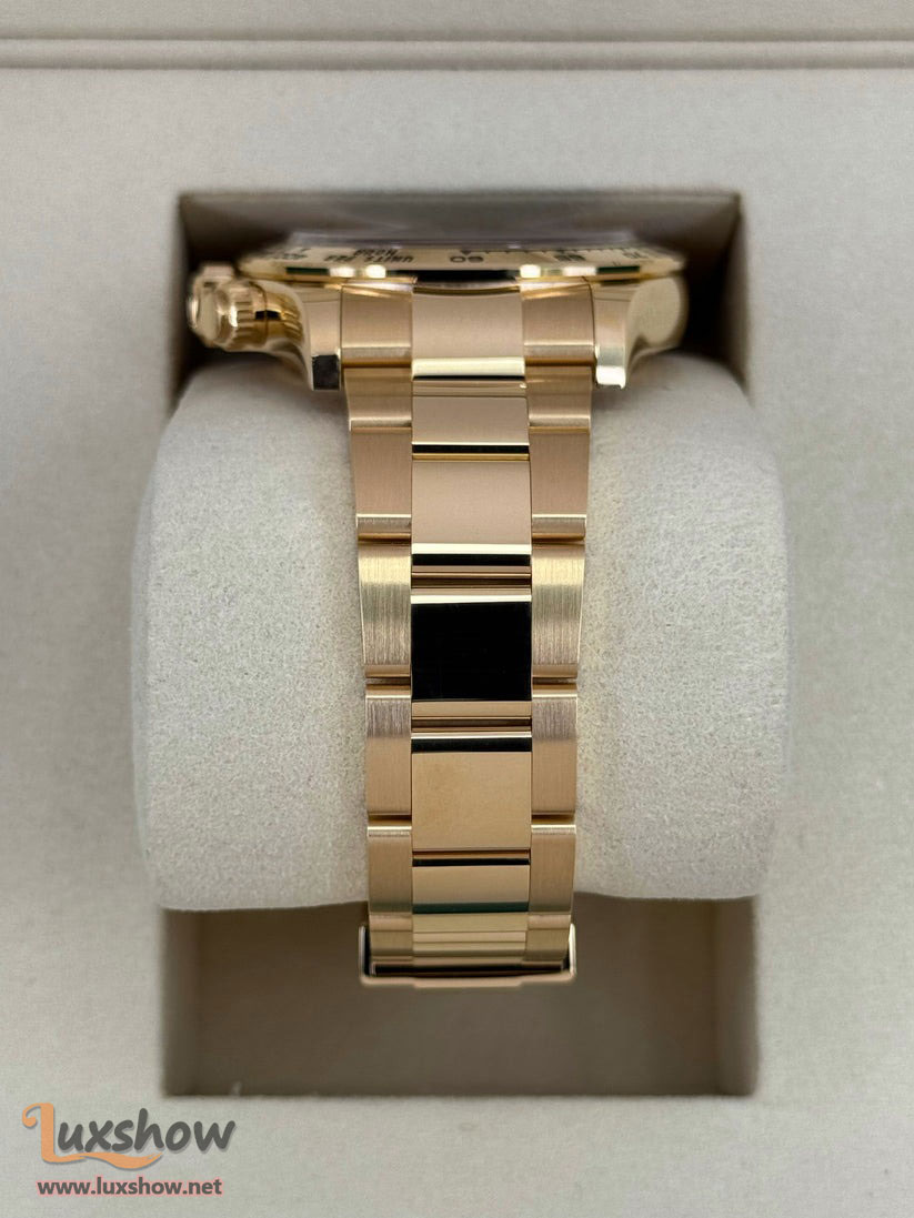 Rolex Cosmograph Daytona 40mm 126508 18kt Yellow Gold Oyster Bracelet a 18kt Yellow Gold Bezel with an Intense Black and Champagne Colour Dial