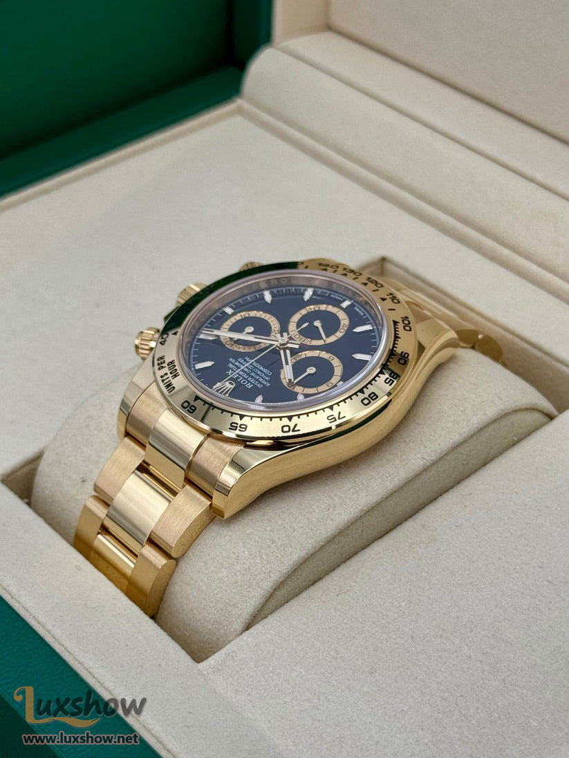 Rolex Cosmograph Daytona 40mm 126508 18kt Yellow Gold Oyster Bracelet a 18kt Yellow Gold Bezel with an Intense Black and Champagne Colour Dial