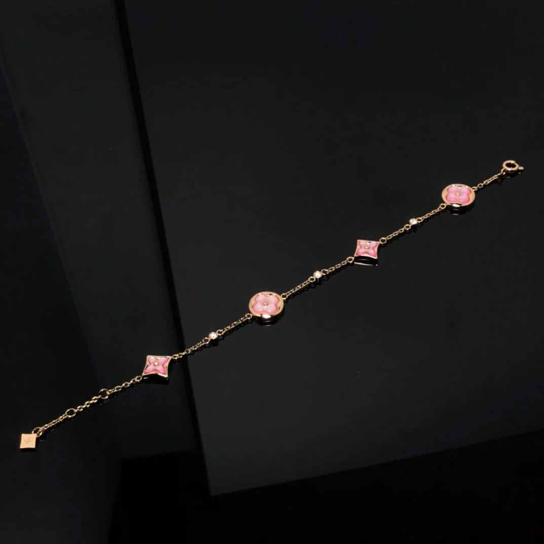 Regalia jewelrySTAR AND SUN 4 MOTIF PINK MOP PINK GOLD BRACELET