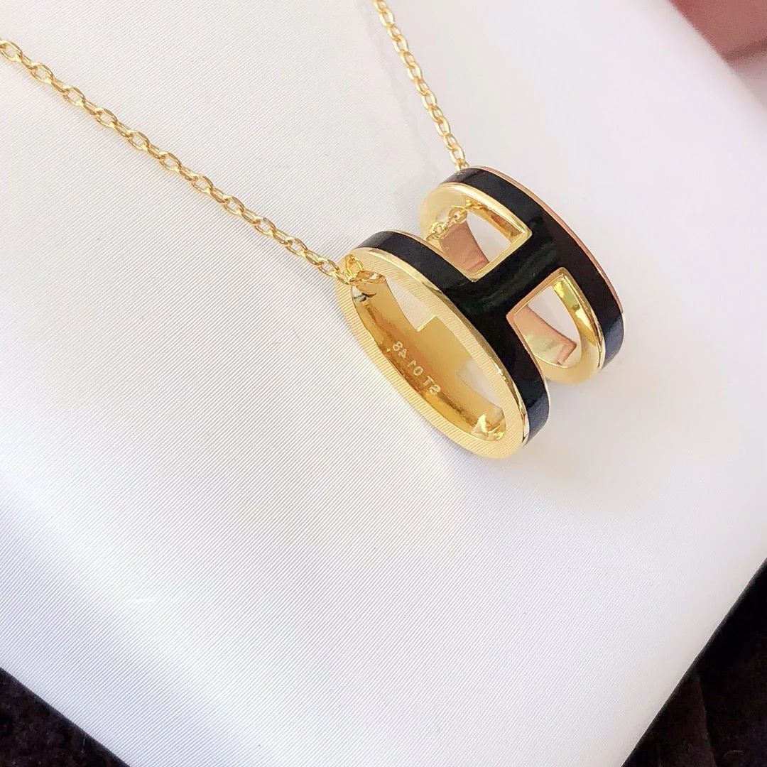Regalia jewelryHM CLIC BLACK ENAMEL GOLD NECKLACE
