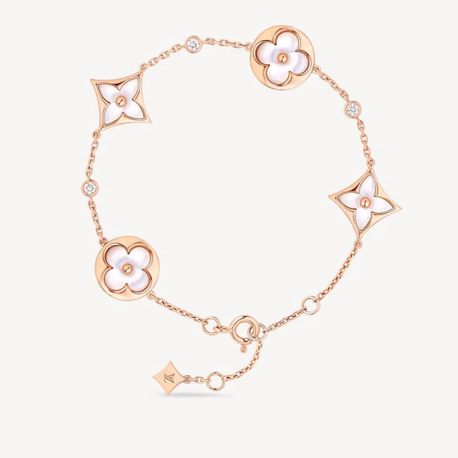 Regalia jewelrySTAR AND SUN 4 MOTIF WHITE MOP PINK GOLD BRACELET