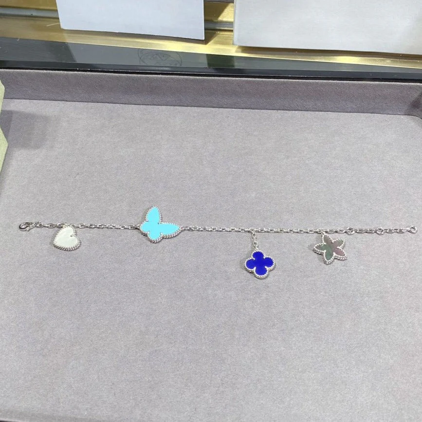 Regalia jewelryLUCKY SPRING SILVER BRACELET 4 MOTIF