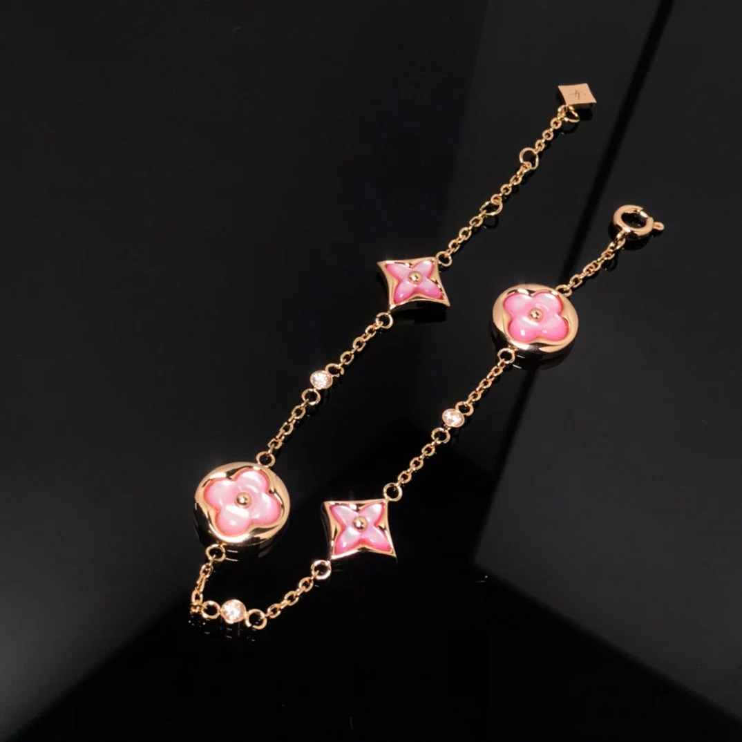 Regalia jewelrySTAR AND SUN 4 MOTIF PINK MOP PINK GOLD BRACELET