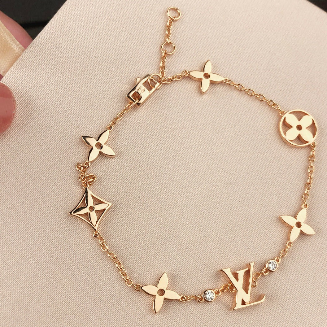 Regalia jewelrySTAR AND SUN 7 MOTIFS GOLD BRACELET