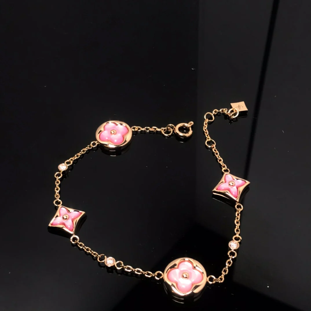 Regalia jewelrySTAR AND SUN 4 MOTIF PINK MOP PINK GOLD BRACELET