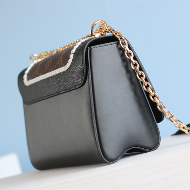 Twist Medium Handbag bag Size 23*18*8cm