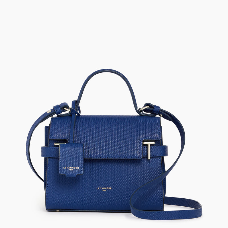 Emilie small handbag with flap closure in monogrammed leather