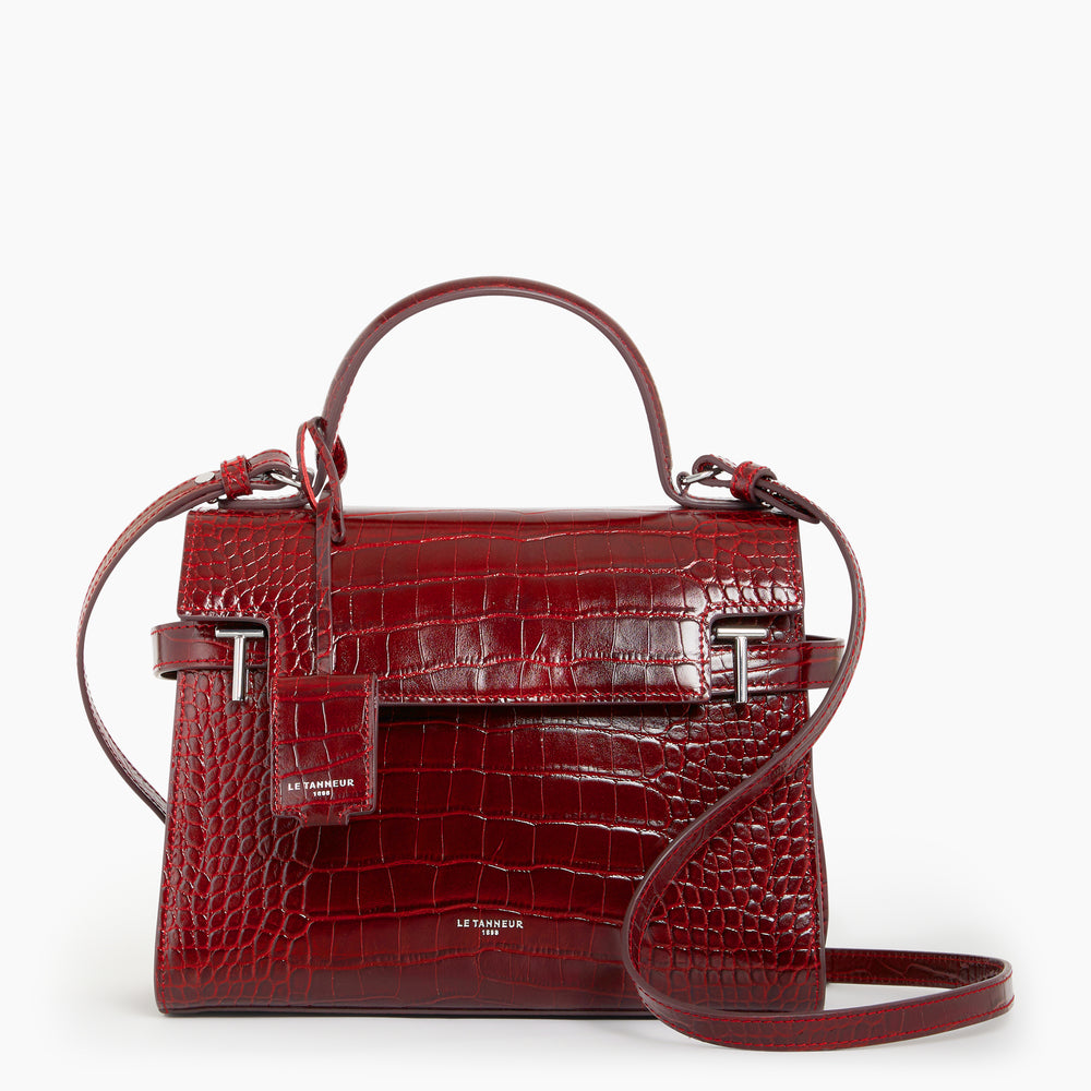 Emilie medium-sized handbag with flap closure in crocodile-embossed leather