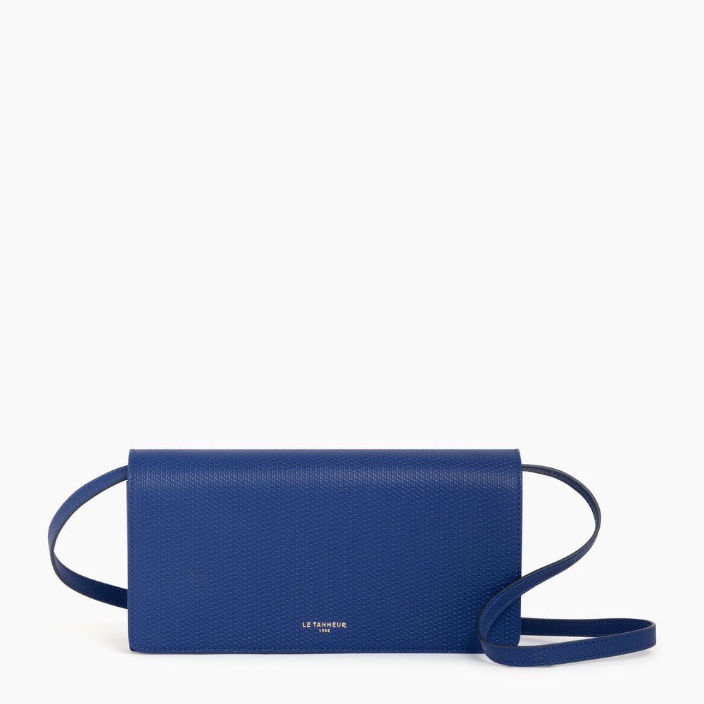 Emilie clutch with flap closure and removable crossbody strap in monogrammed leather