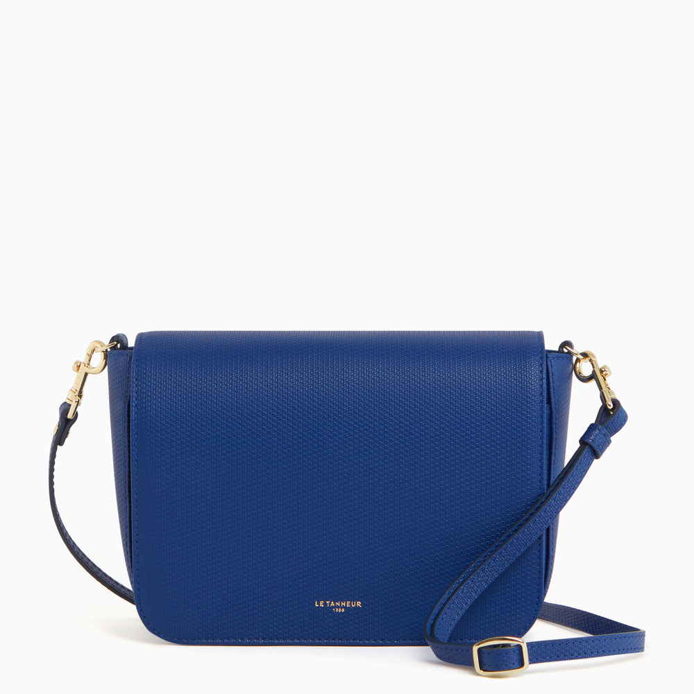 Lise clutch with flap closure and removable crossbody strap in monogrammed leather