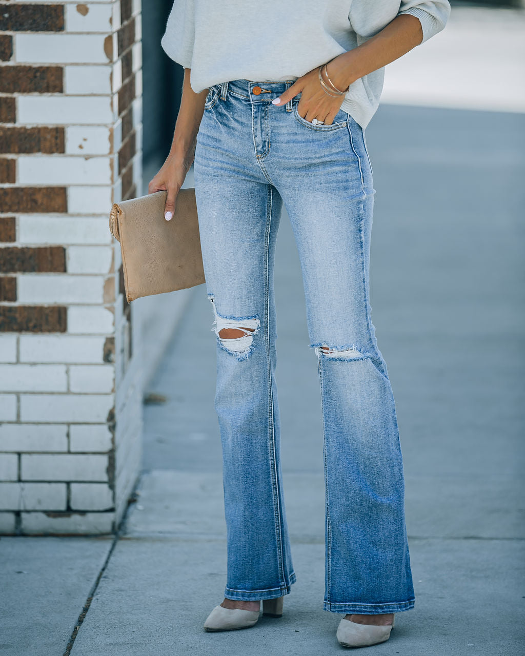 Genie Distressed Mid Rise Bootcut Jeans