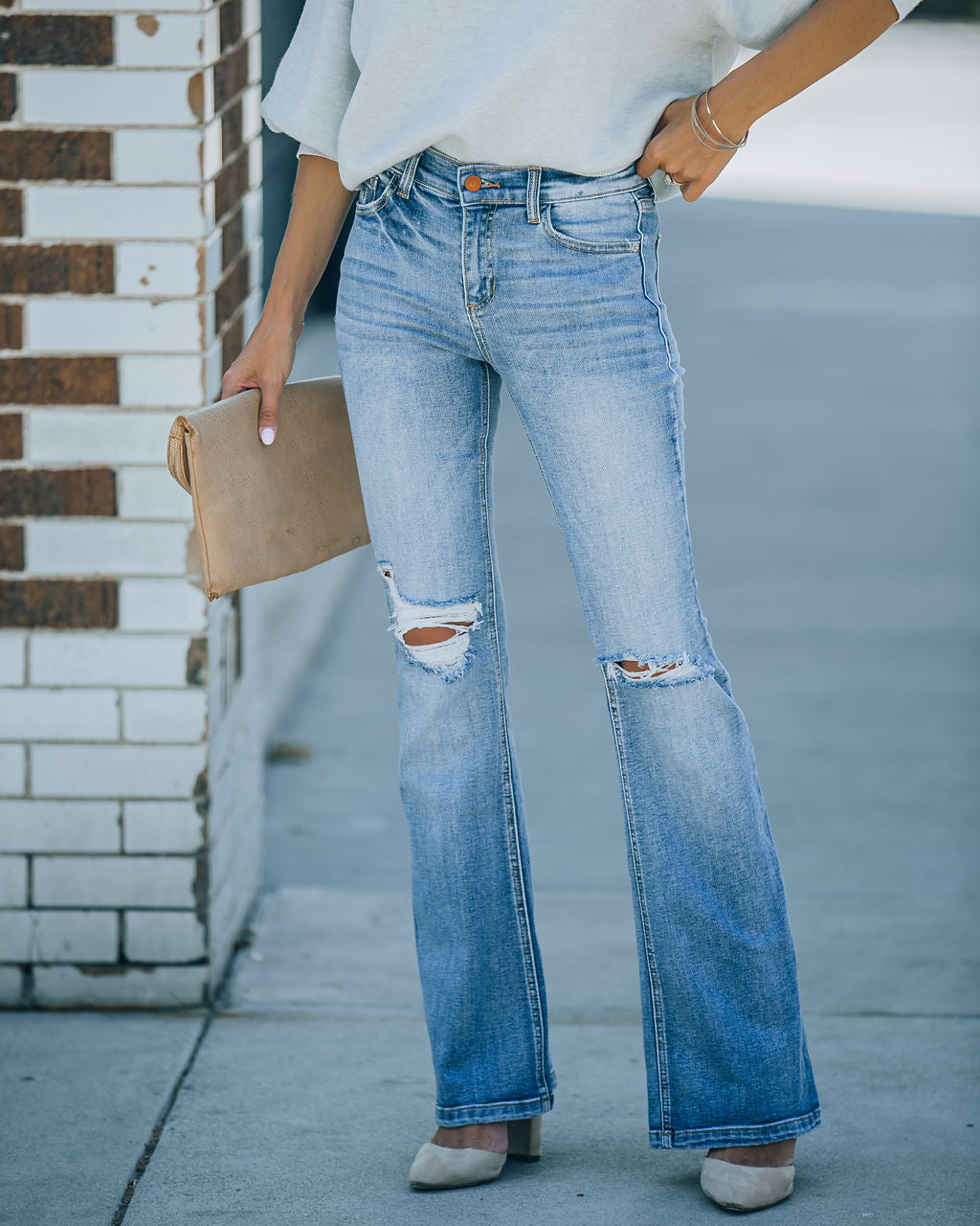 Genie Distressed Mid Rise Bootcut Jeans