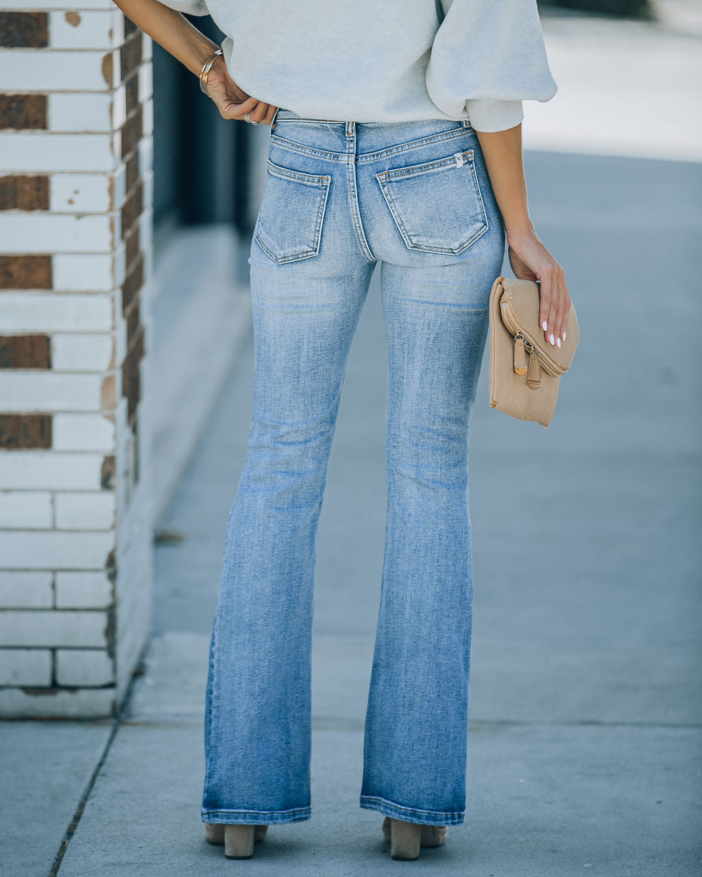 Genie Distressed Mid Rise Bootcut Jeans