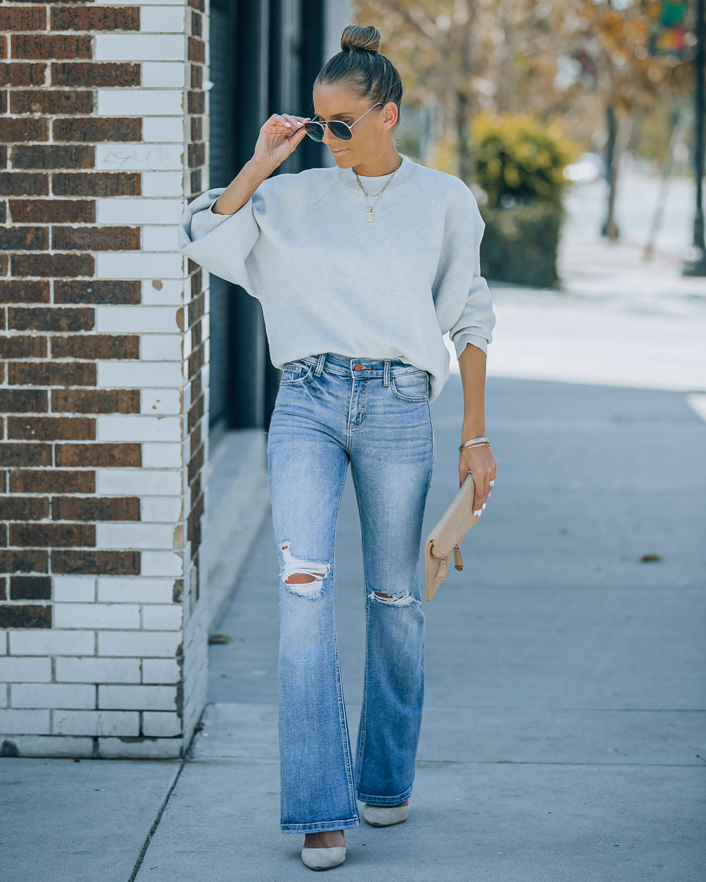 Genie Distressed Mid Rise Bootcut Jeans