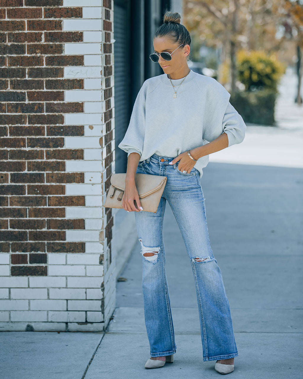 Genie Distressed Mid Rise Bootcut Jeans