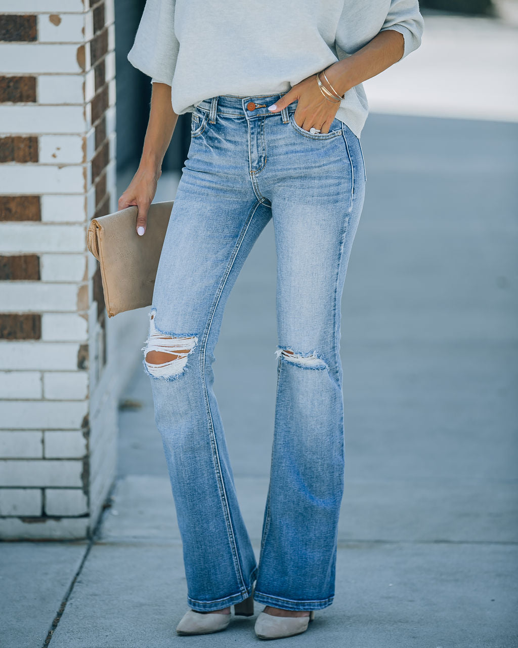 Genie Distressed Mid Rise Bootcut Jeans