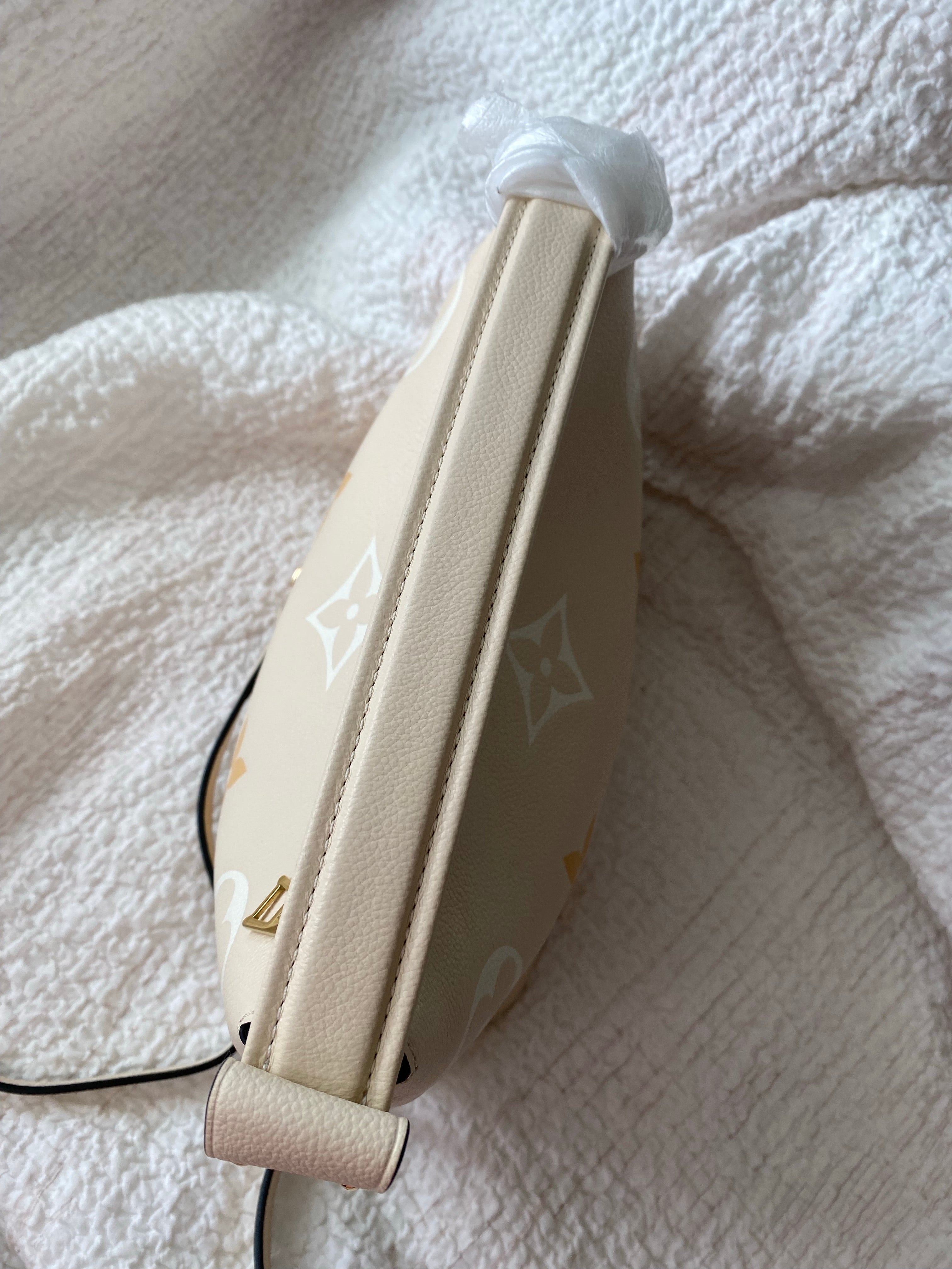 [TOP] L&V £V Empreinte Monogram Giant By The Pool Marshmallow Hobo Bag - Cream Saffron - LV Louis Vuitton