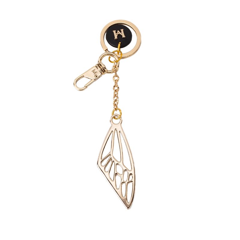 Accesorio charm ala mh negro oro Suspiros