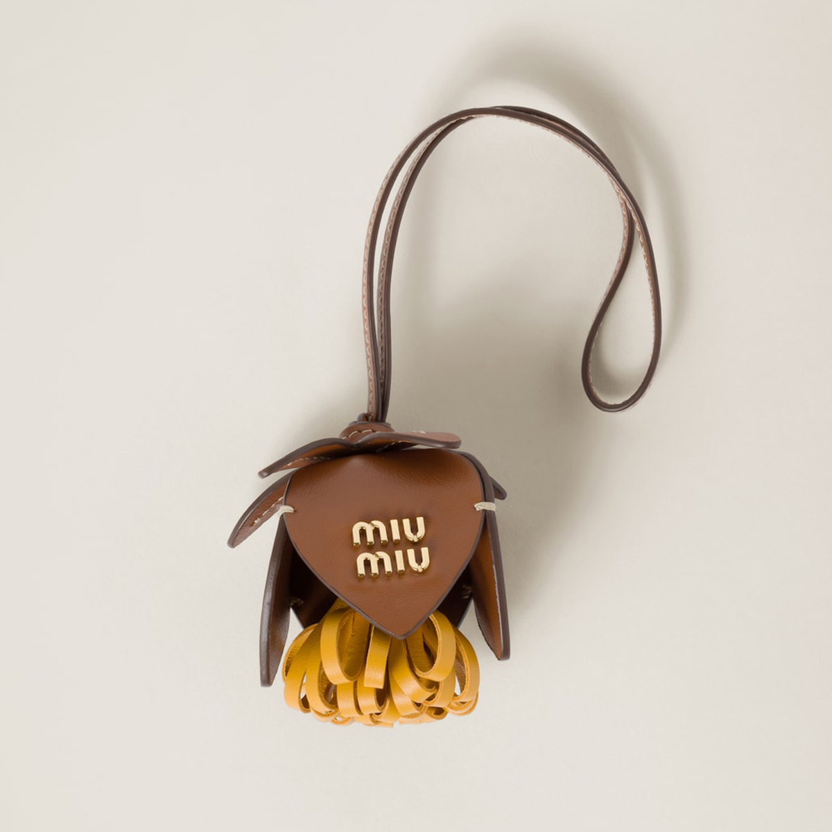 NIGO MiuMiu Autumn And Winter Fashion Leather Trick Metal Logo Hollow Carved Flowers Pendant Bag Jewelry 5TL498_2CQS_F0T35 #nigo71669