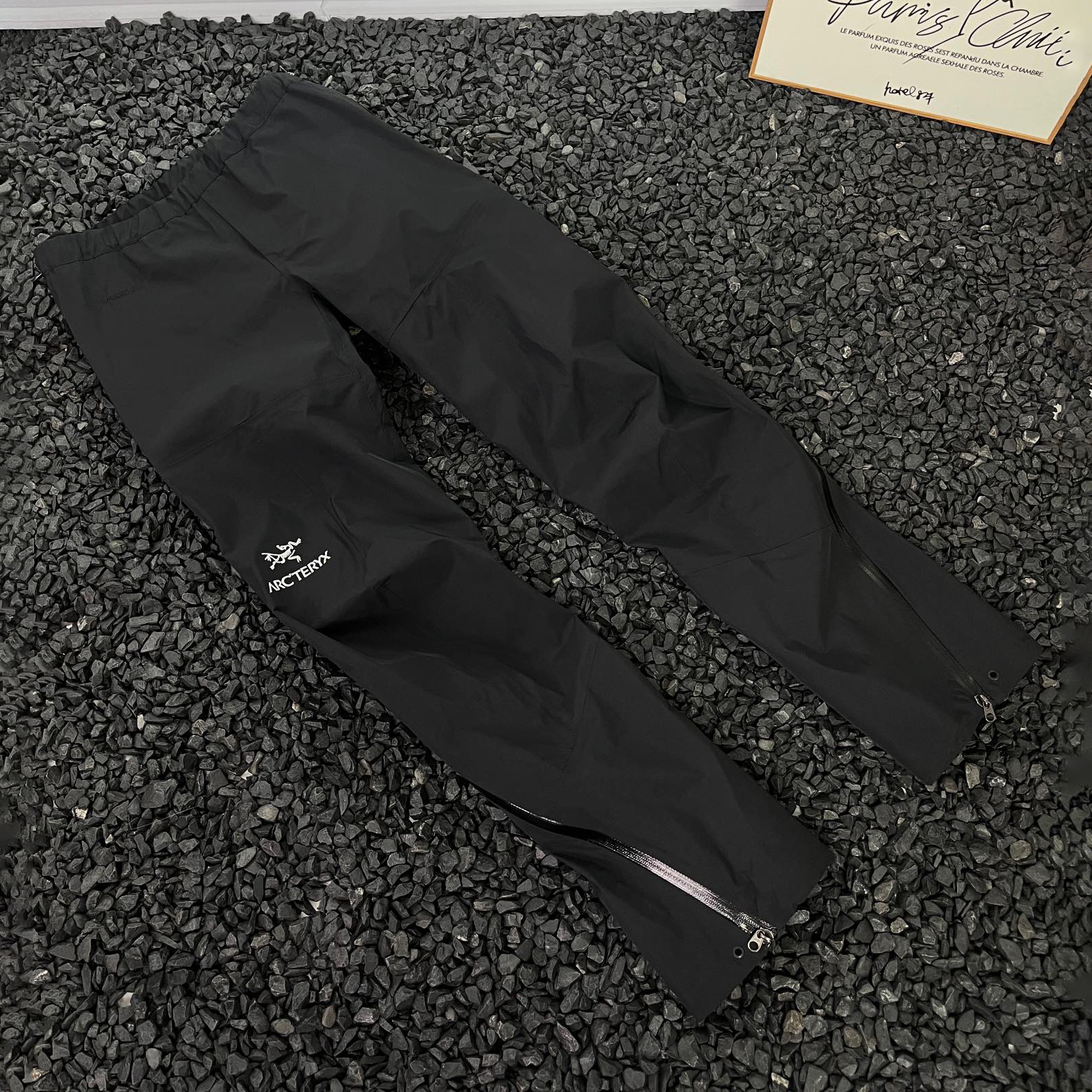 NIGO Arcteryx Men's Spring and Autumn Solid Color Side Zipper Waterproof Fabric Pants #nigo73927