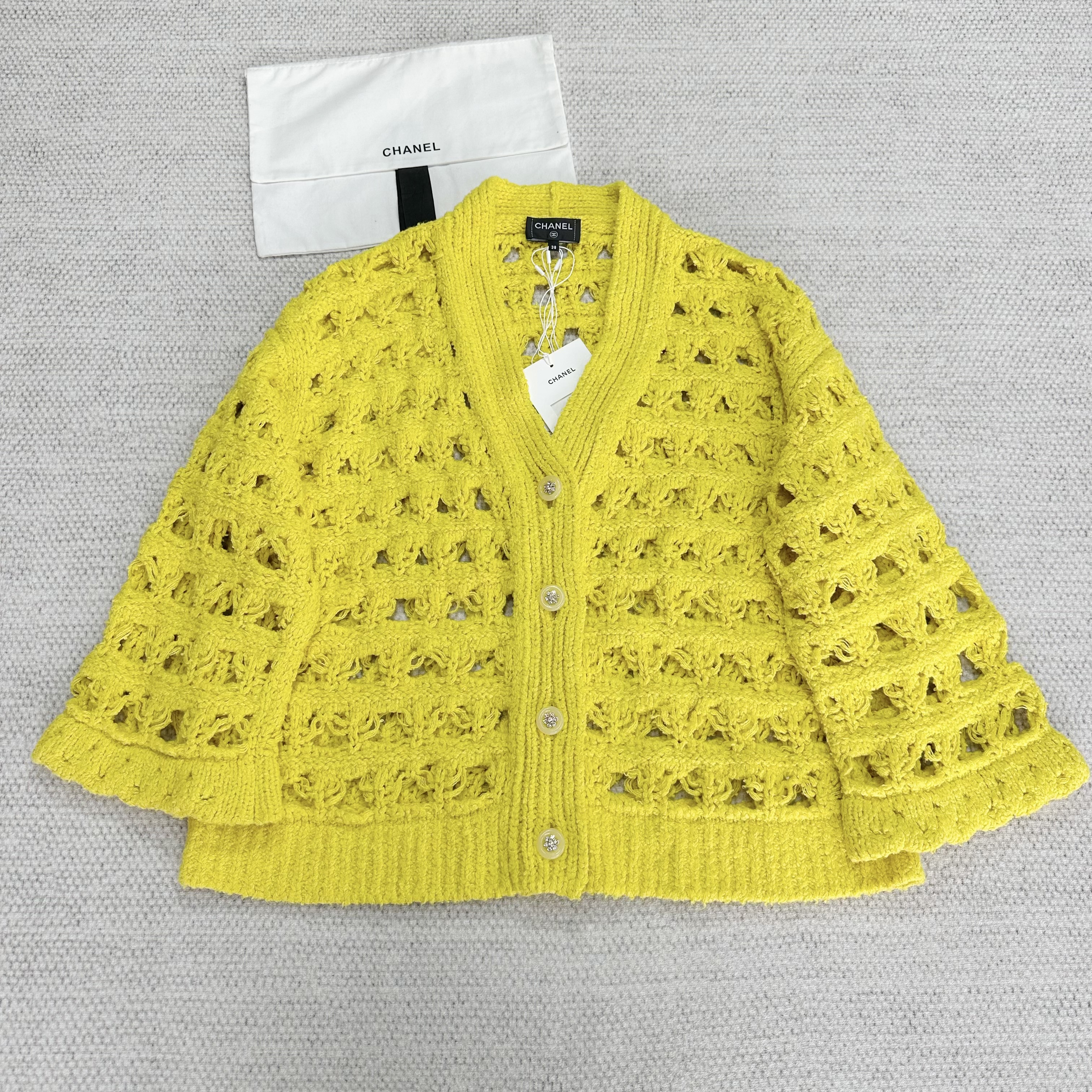 NIGO Chanel Women‘s Spring and Autumn Solid Color Skeleton Knit V-Neck Long Sleeve Jacket #nigo75196