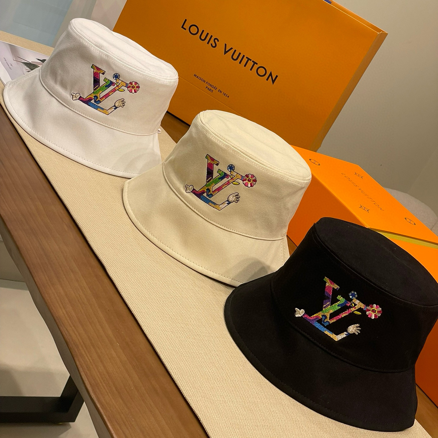 NIGO Louis Vuitton Men's And Women's Colorful Letters Embroidered Printed Cotton Reversible Fisherman's Hat Cap #nigo75642