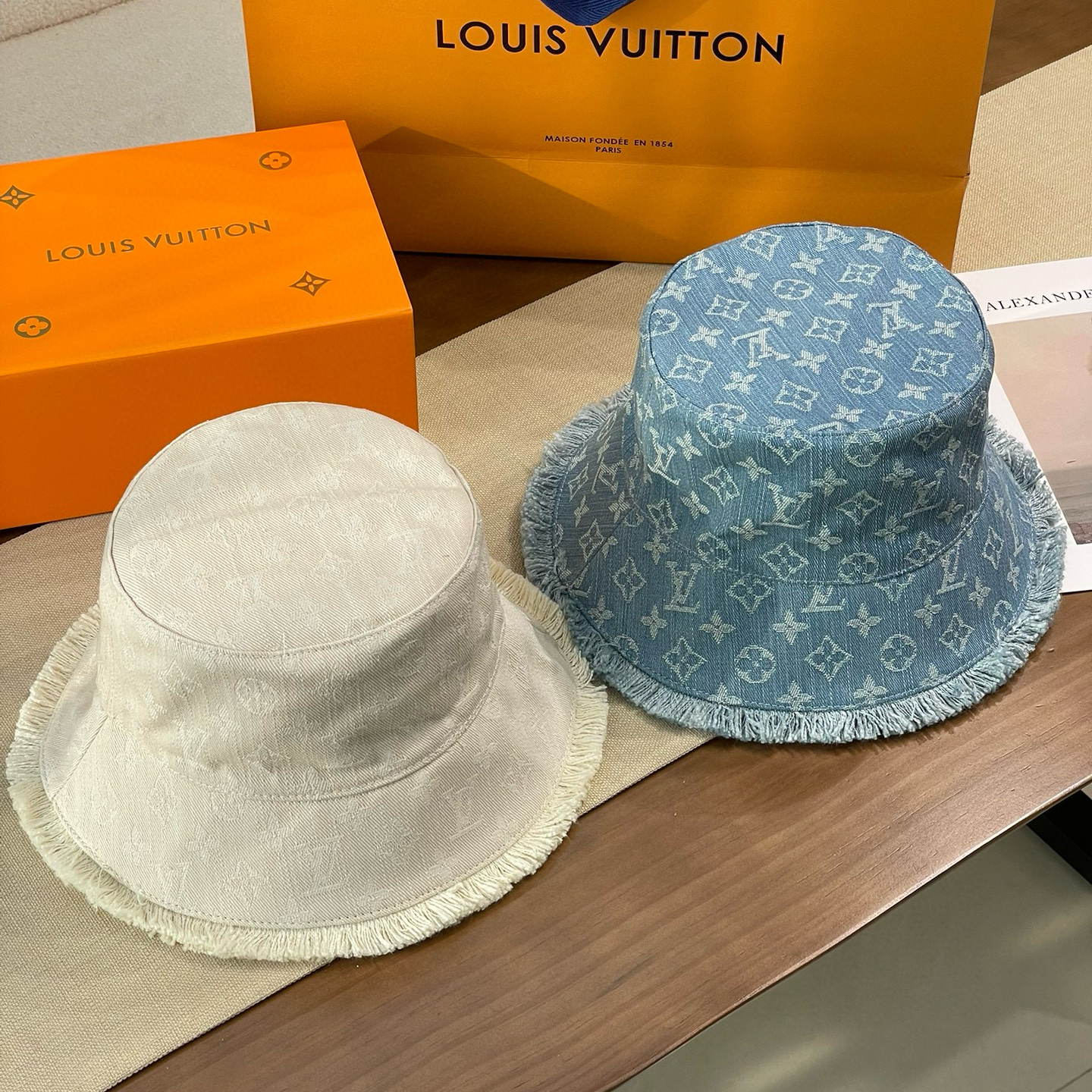 NIGO Louis Vuitton Men's and Women's Solid Color Letter Jacquard Raw Edge Cotton Fisherman's Hat Cap #nigo76292
