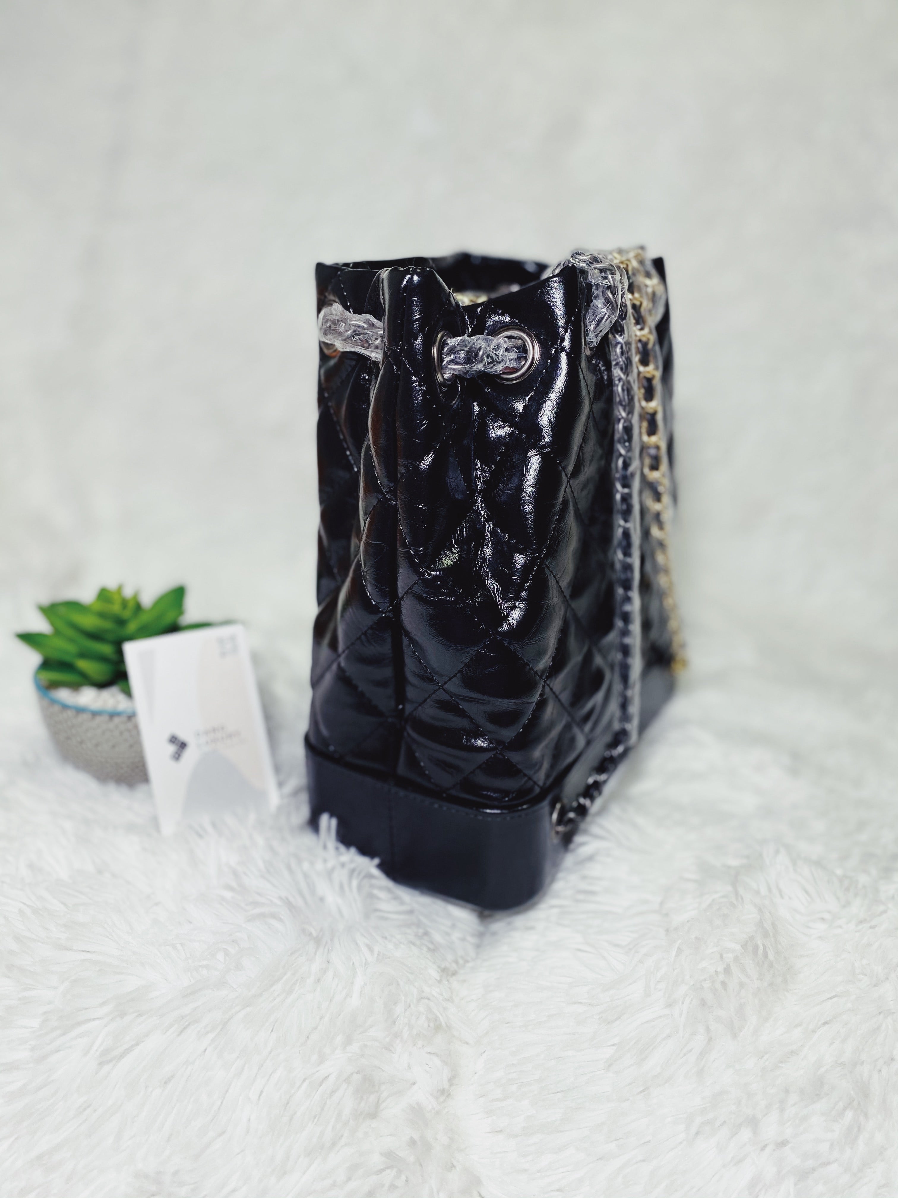 [TOP] CHANEL Quilted Bucket Backpack - BLACK