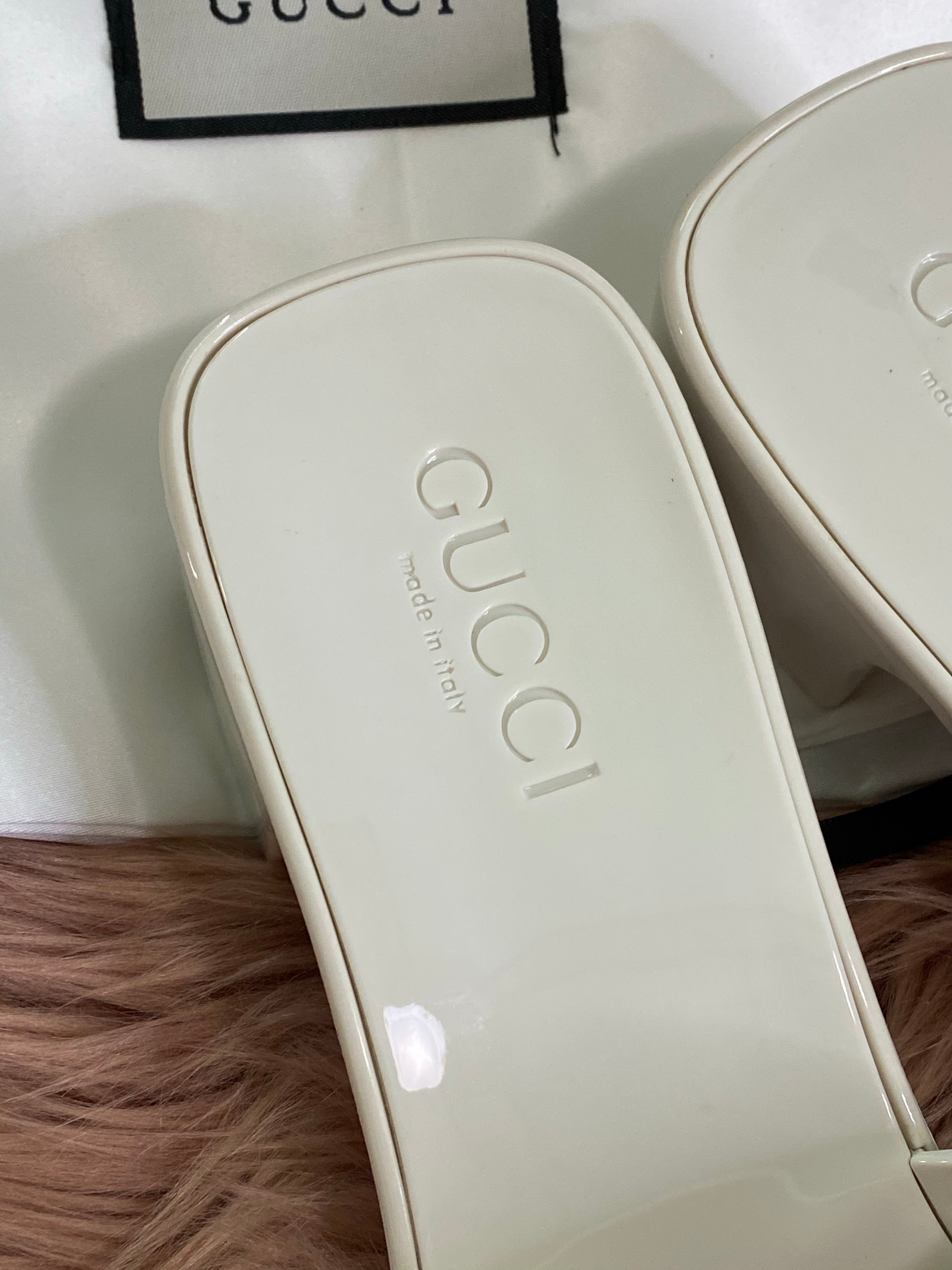 [TOP] GUCCI GG Logo Embossed Rubber Mules - White