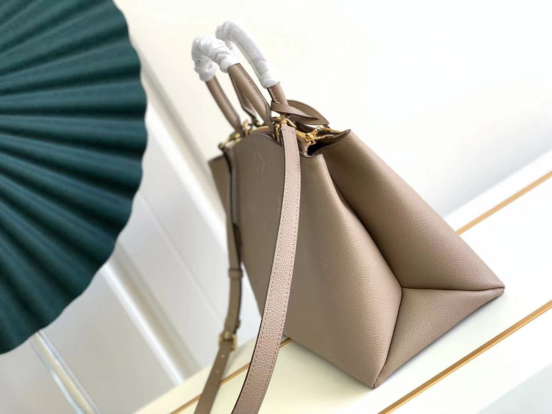 [TOP] Louis Vuitton LV L*V Grand Palais Monogram Empreinte Bag - Turtle Dove