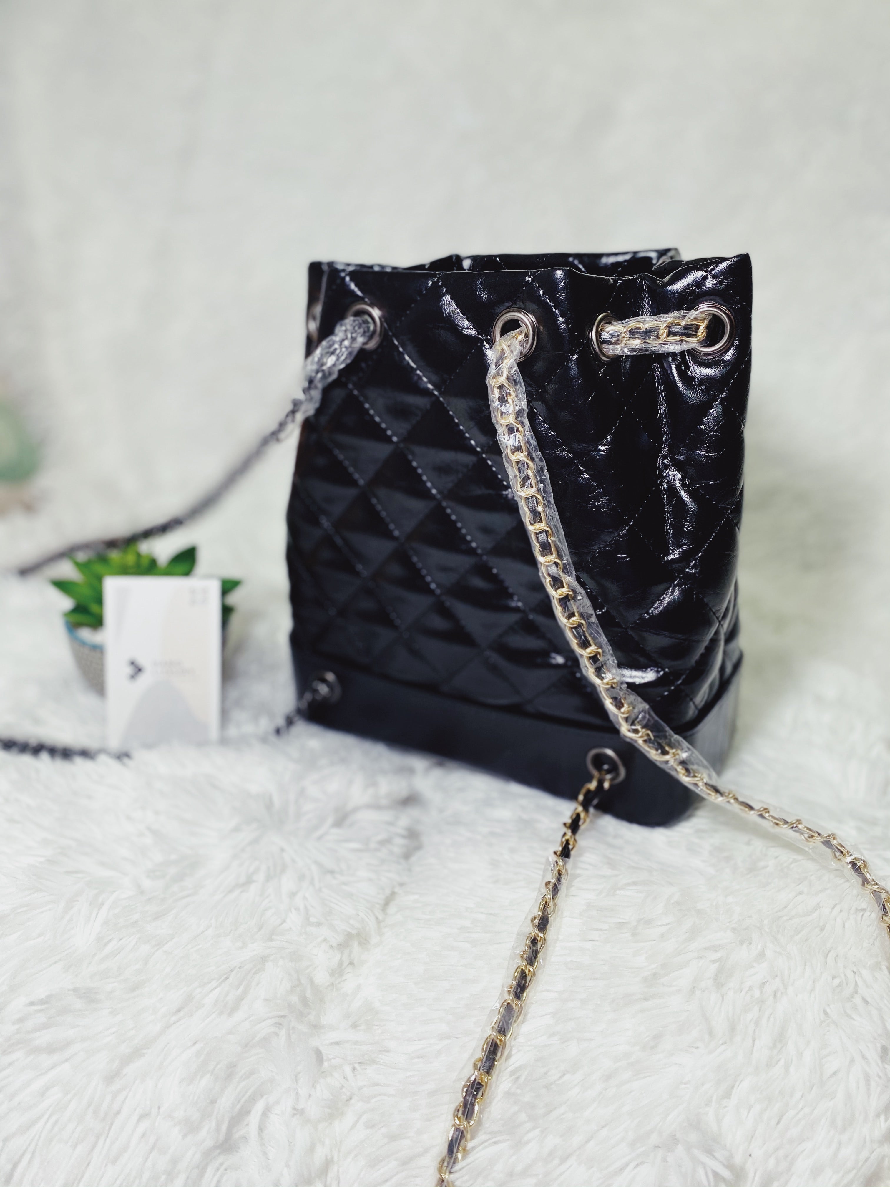 [TOP] CHANEL Quilted Bucket Backpack - BLACK