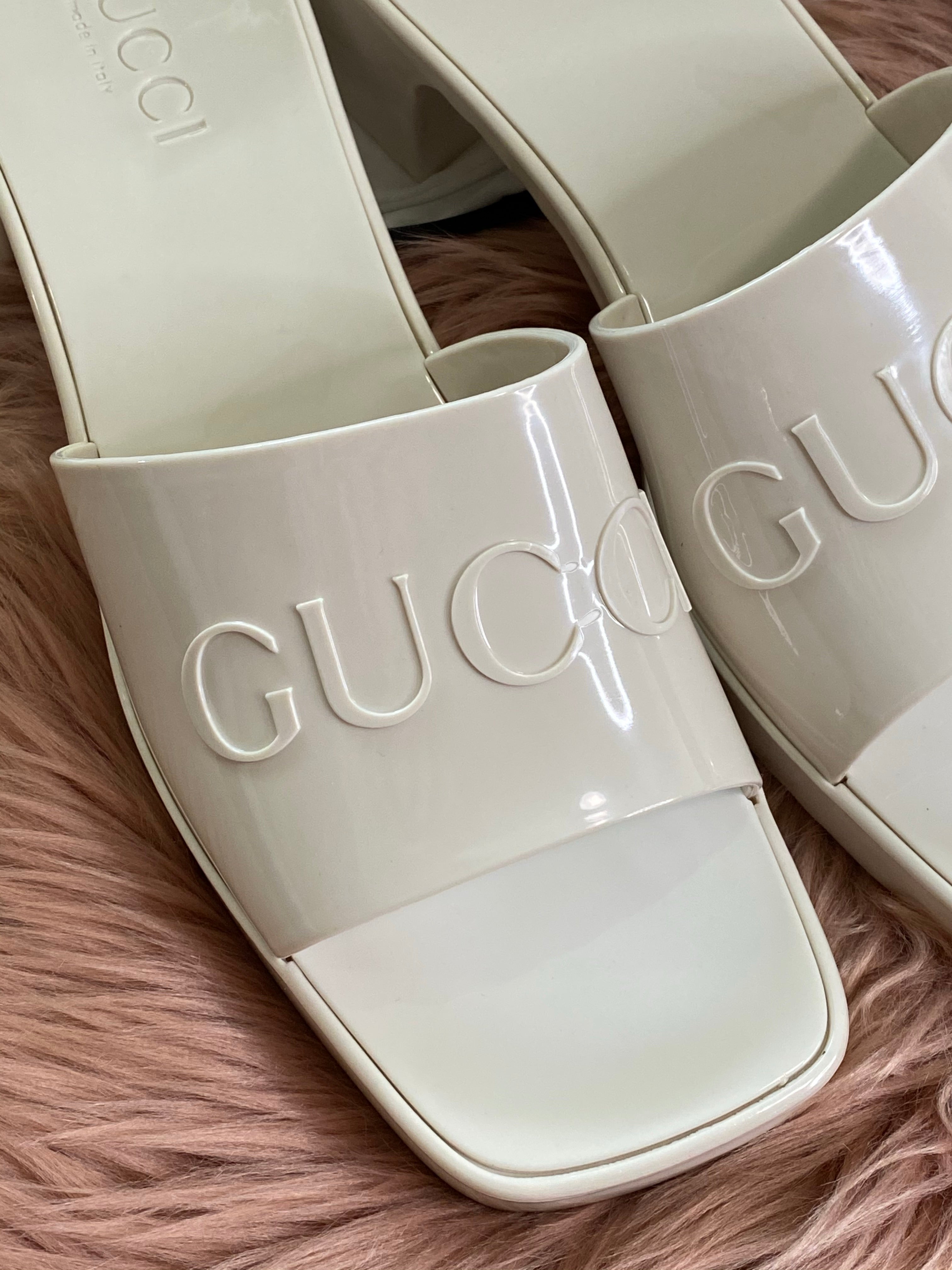 [TOP] GUCCI GG Logo Embossed Rubber Mules - White