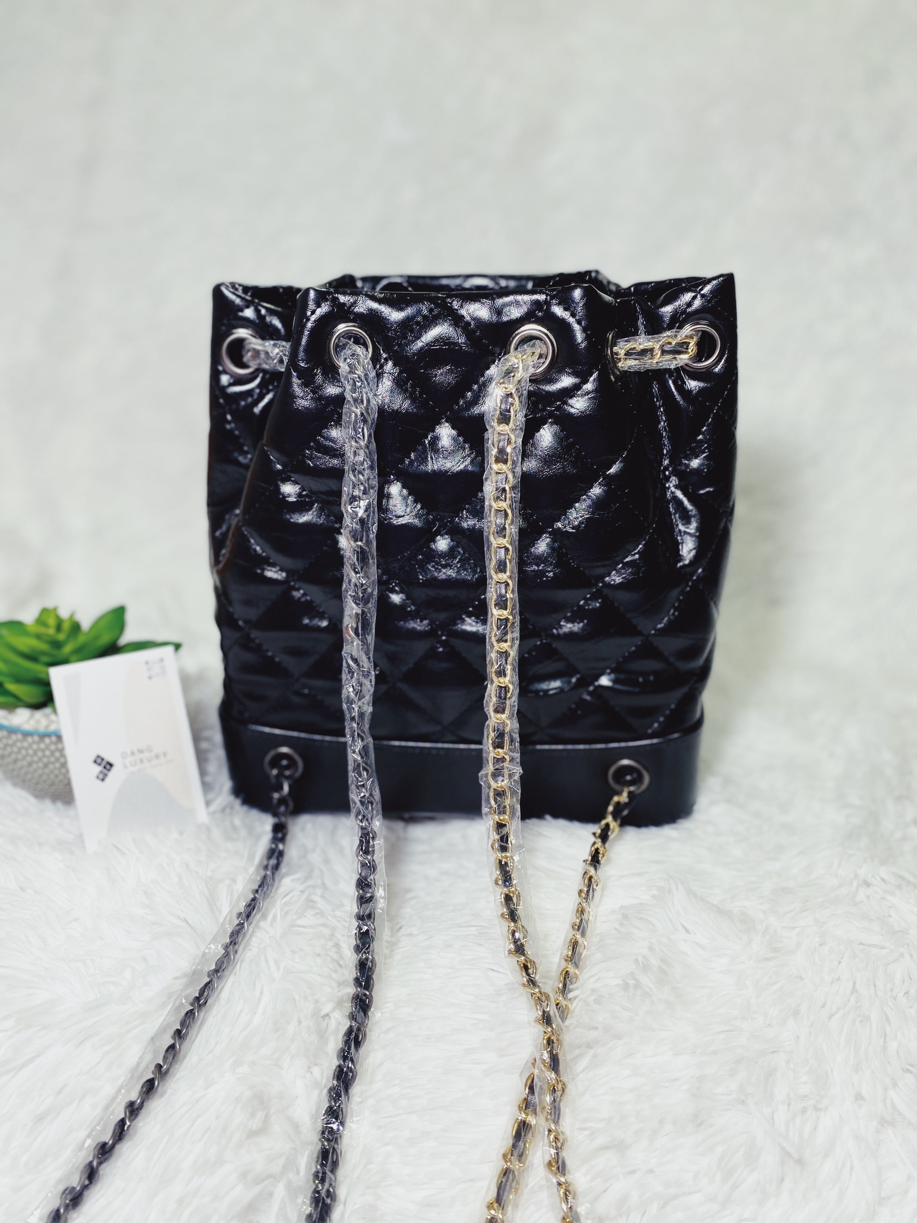 [TOP] CHANEL Quilted Bucket Backpack - BLACK