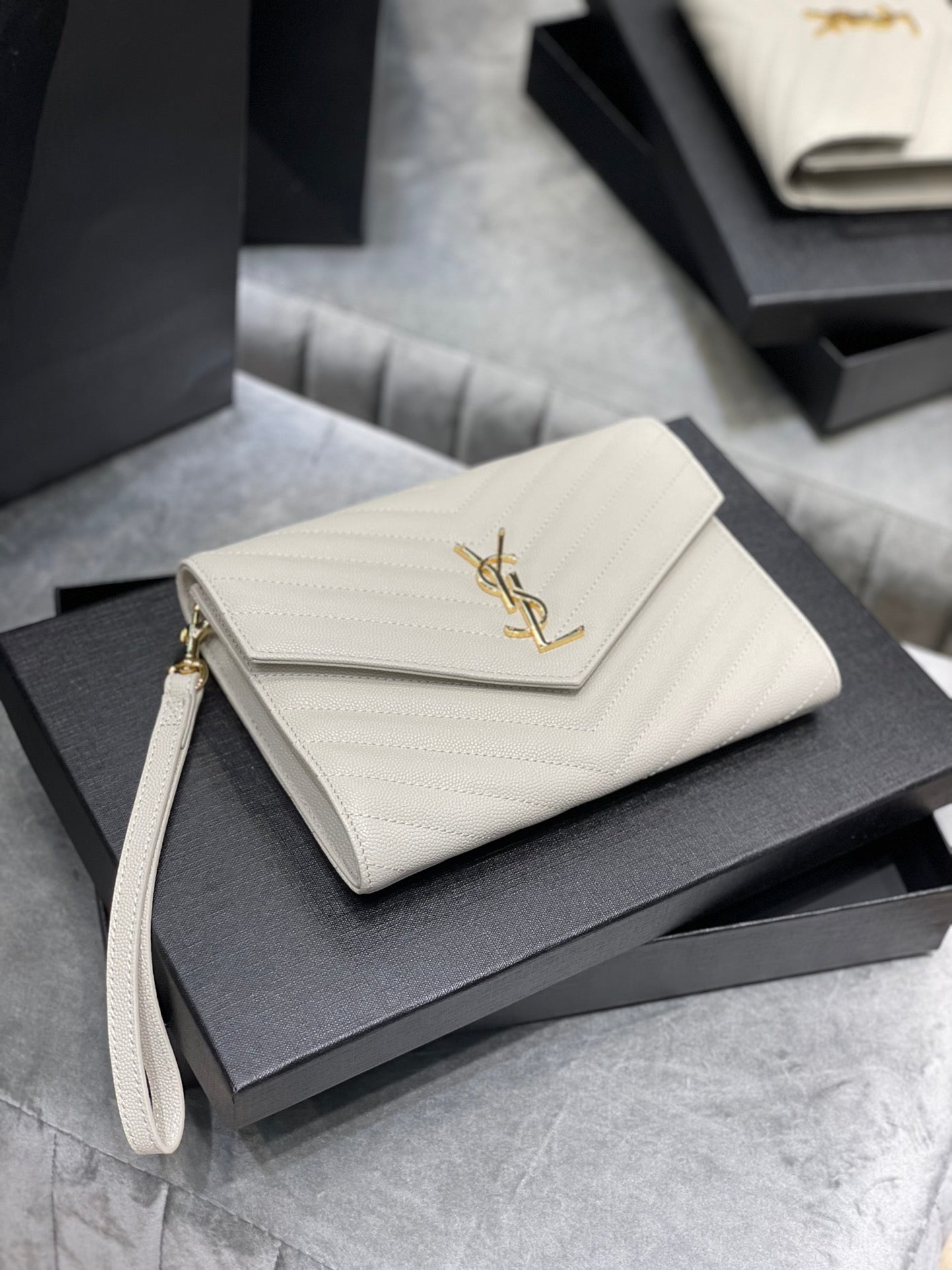 [TOP] Yves Saint Laurent YSL Monogram Clutch Embossed Leather - White