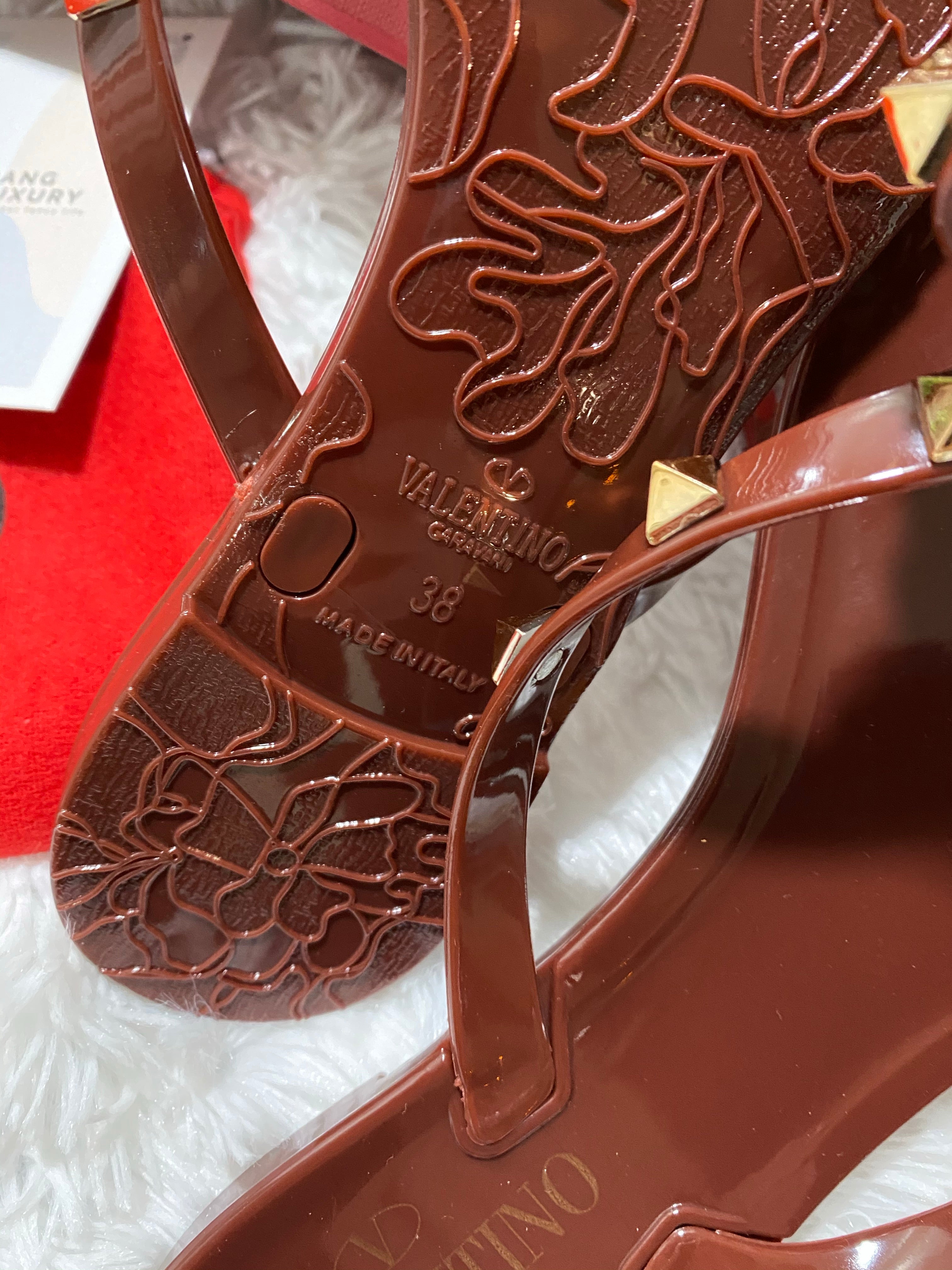 [TOP] VALENTINO Jelly Rock Stud Flat Thong Sandals