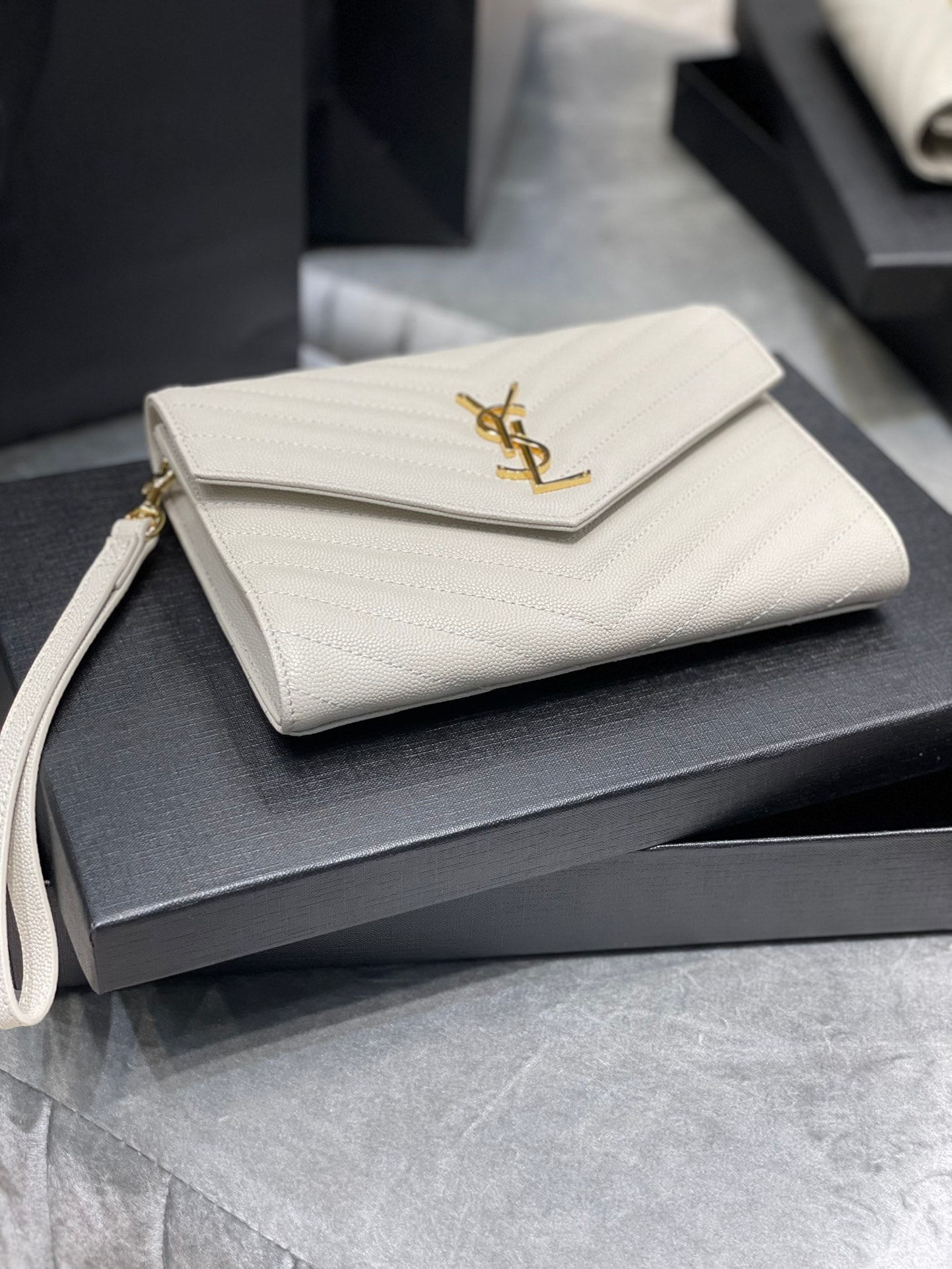 [TOP] Yves Saint Laurent YSL Monogram Clutch Embossed Leather - White